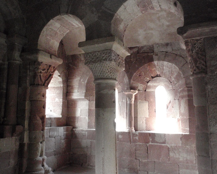 Columns of red sandstone inside the twelfth-century chapel of Saint-Michel