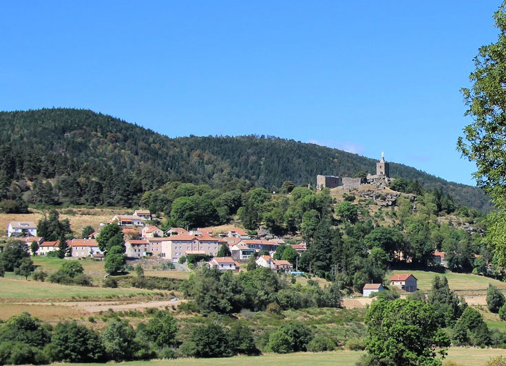Cluster of houses in the village of Luc stretch along the side of the ridge. Above is the ruins of the château.